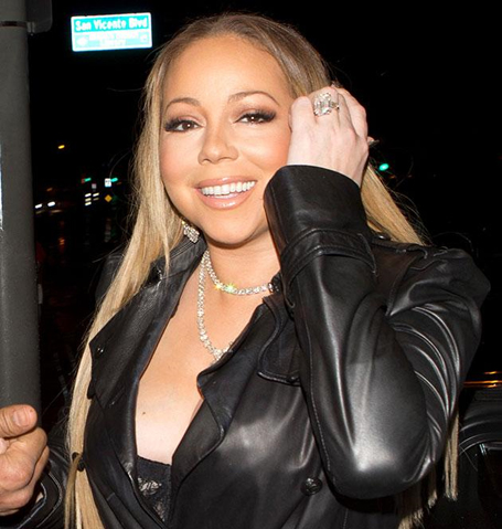 Mariah puts Packer's ring back on | mcarchives.com