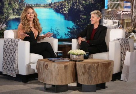 Ellen cannot stop staring at Mariah's set of diamonds | mcarchives.com