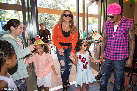 Mariah and Nick take their twins to Disneyland | mcarchives.com