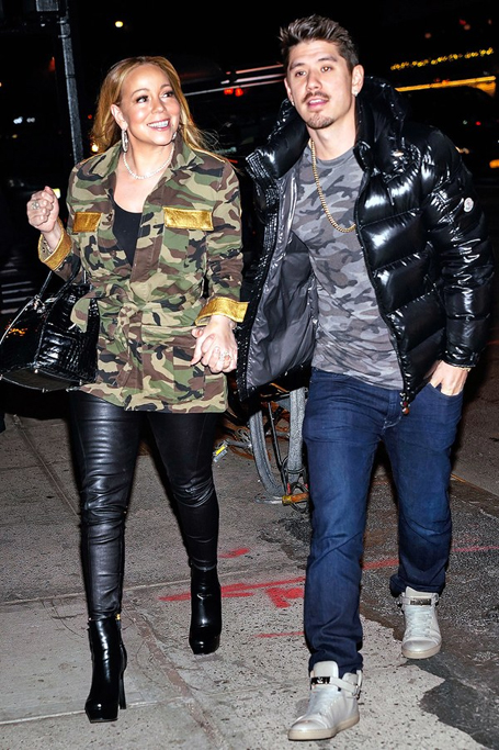 Mariah and boyfriend coordinate their camouflage outfits | mcarchives.com