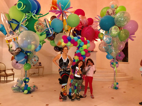 Mariah gets a bounce house for her twins' birthday party | mcarchives.com