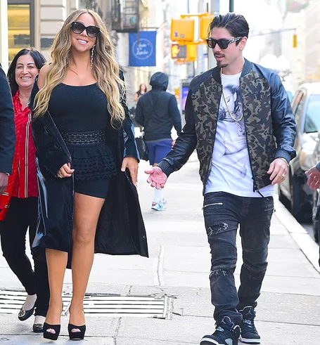 Mariah Carey showcases curvaceous figure in tiny LBD | mcarchives.com