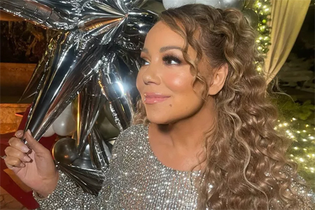 Mariah Carey celebrates 2024 by posting rare photo | mcarchives.com