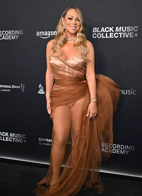 Mariah Carey wears leg-baring bronze gown | mcarchives.com