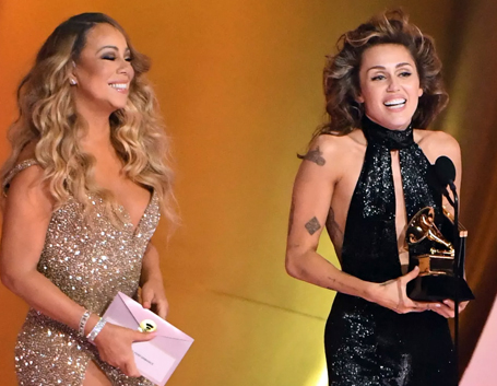 Miley Cyrus fangirls over fellow M.C. Mariah Carey | mcarchives.com