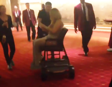 Mariah Carey being wheeled to stage at Vegas show | mcarchives.com