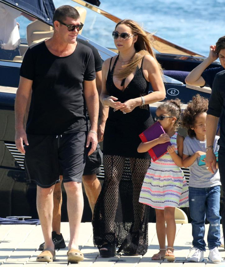 Mariah boards yacht with James and dem babies | mcarchives.com